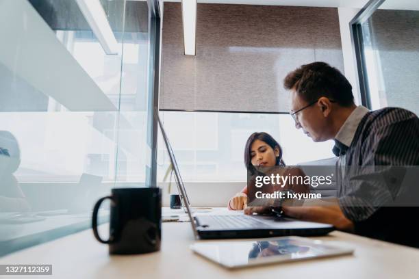 asian business professionals working in office - market research stock pictures, royalty-free photos & images