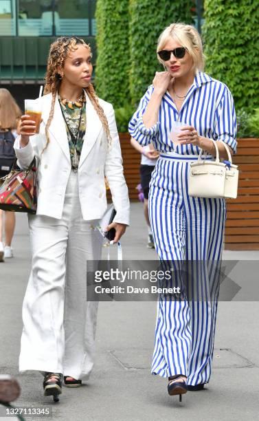 Twigs and Sienna Miller attend day 8 of Wimbledon 2021 at All England Lawn Tennis and Croquet Club on July 05, 2021 in London, England.