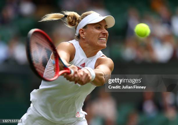 Angelique Kerber of Germany plays a backhand in her Ladies' Singles Fourth Round match against Coco Gauff of The United States during Day Seven of...