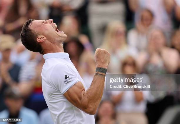 Marton Fucsovics of Hungary celebrates victory after winning his Men's Singles Fourth Round match against Andrey Rublev of Russia during Day Seven of...