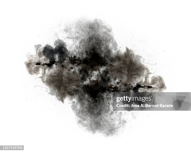 black smoke cloud produced by an explosion on a white background. - wispy stock pictures, royalty-free photos & images