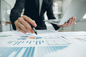 Businessman analyse investment marketing data.