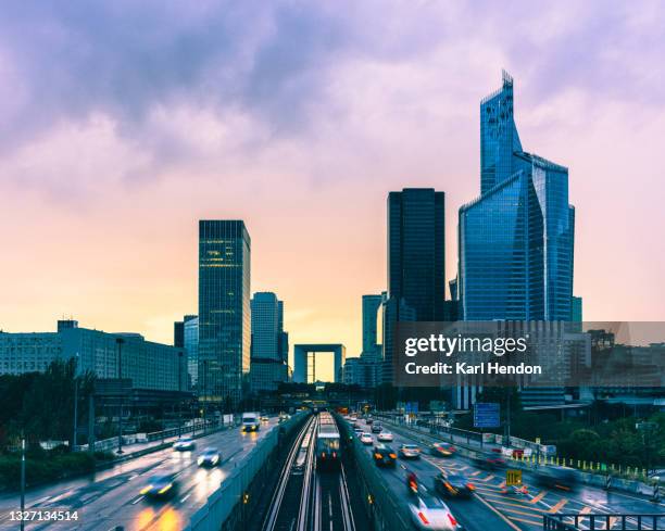 an elevated dusk view of the paris business district - stock photo - grande arche stock pictures, royalty-free photos & images