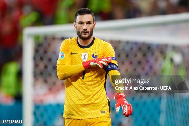 Hugo Lloris of France looks on as he adjusts his captain's armband during the UEFA Euro 2020 Championship Round of 16 match between France and...