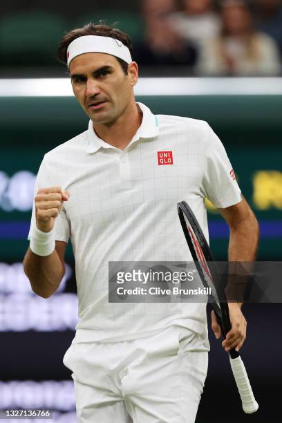Roger Federer of Switzerland celebrates after winning the first set in his Men's Singles Fourth Round match against Lorenzo Sonego of Italy during...