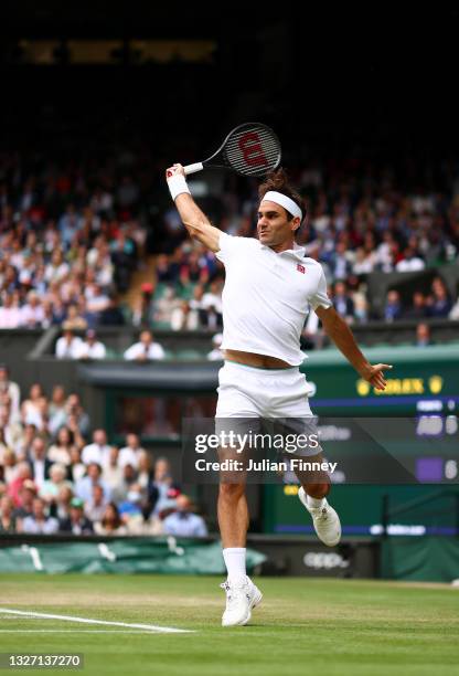 Roger Federer of Switzerland plays a backhand in his Men's Singles Fourth Round match against Lorenzo Sonego of Italy during Day Seven of The...