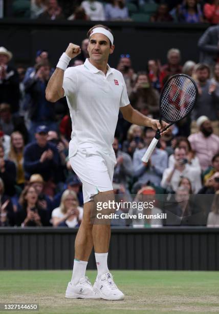 Roger Federer of Switzerland celebrates match point in his Men's Singles Fourth Round match against Lorenzo Sonego of Italy during Day Seven of The...