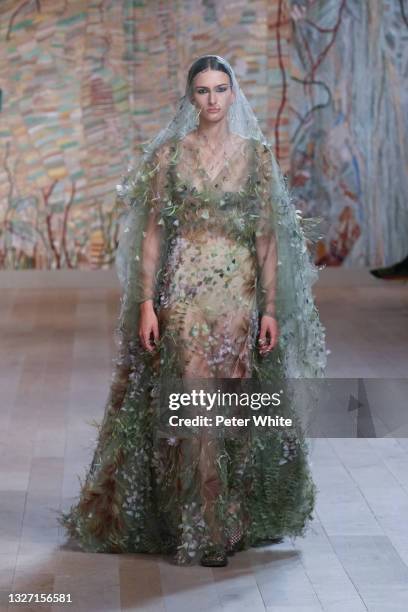 Chai Maximus walks the runway during the Christian Dior Haute Couture Fall/Winter 2021/2022 show as part of Paris Fashion Week on July 05, 2021 in...
