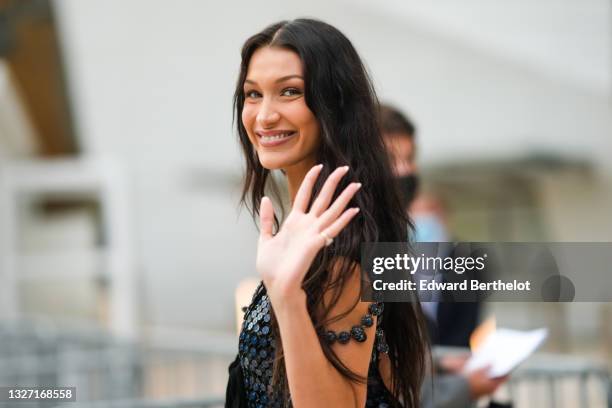 Bella Hadid is seen, outside Louis Vuitton Parfum hosts dinner at Fondation Louis Vuitton, on July 05, 2021 in Paris, France.
