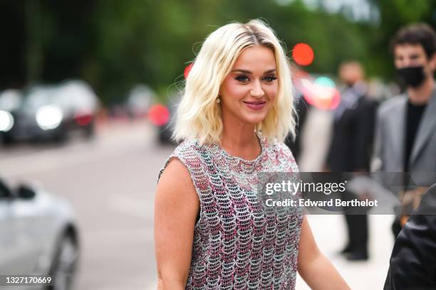 Katy Perry wears a silver and pink sleeveless mesh tank top, outside Louis Vuitton Parfum hosts dinner at Fondation Louis Vuitton, during Paris...