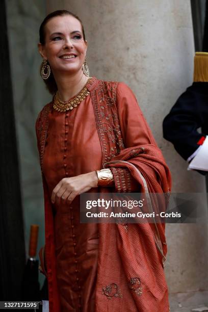 French actress Carole Bouquet arrives to attend a state dinner organized by French President Emmanuel Macron and his wife Brigitte Macron for Italian...