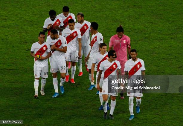 Gianluca Lapadula and Sergio Peña of Peru talk as leaving the pitch at the end of the first half during a semi-final match of Copa America Brazil...