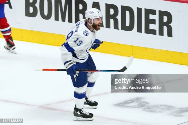 Barclay Goodrow of the Tampa Bay Lightning celebrates after scoring a goal against the Montreal Canadiens during the second period in Game Four of...