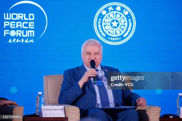 Russian Ambassador to China Andrey Denisov attends a plenary session on 'Reshaping Relations among Major Powers' during the 9th World Peace Forum on...