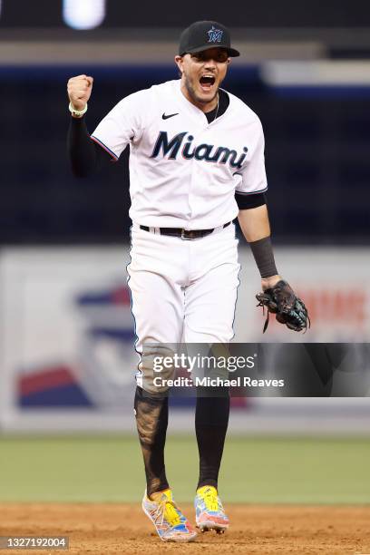 Miguel Rojas of the Miami Marlins reacts against the Los Angeles Dodgers during the ninth inning at loanDepot park on July 05, 2021 in Miami, Florida.