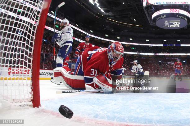 Barclay Goodrow of the Tampa Bay Lightning scores a goal past Carey Price of the Montreal Canadiens during the second period in Game Four of the 2021...