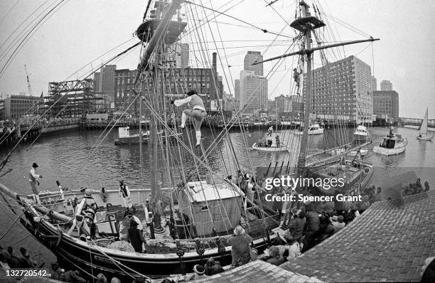 In an event sponsored by the American Revolution Bicentennial Commission and Boston 200, costumed National Guardsmen swarm the deck of the HMS...