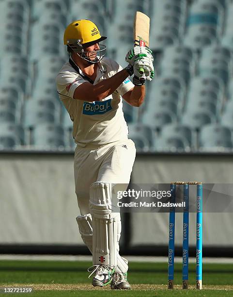 Mitchell Marsh of the Warriors hooks for four during the Sheffield Shield match between the Victoria Bushrangers and the Western Australia Warriors...