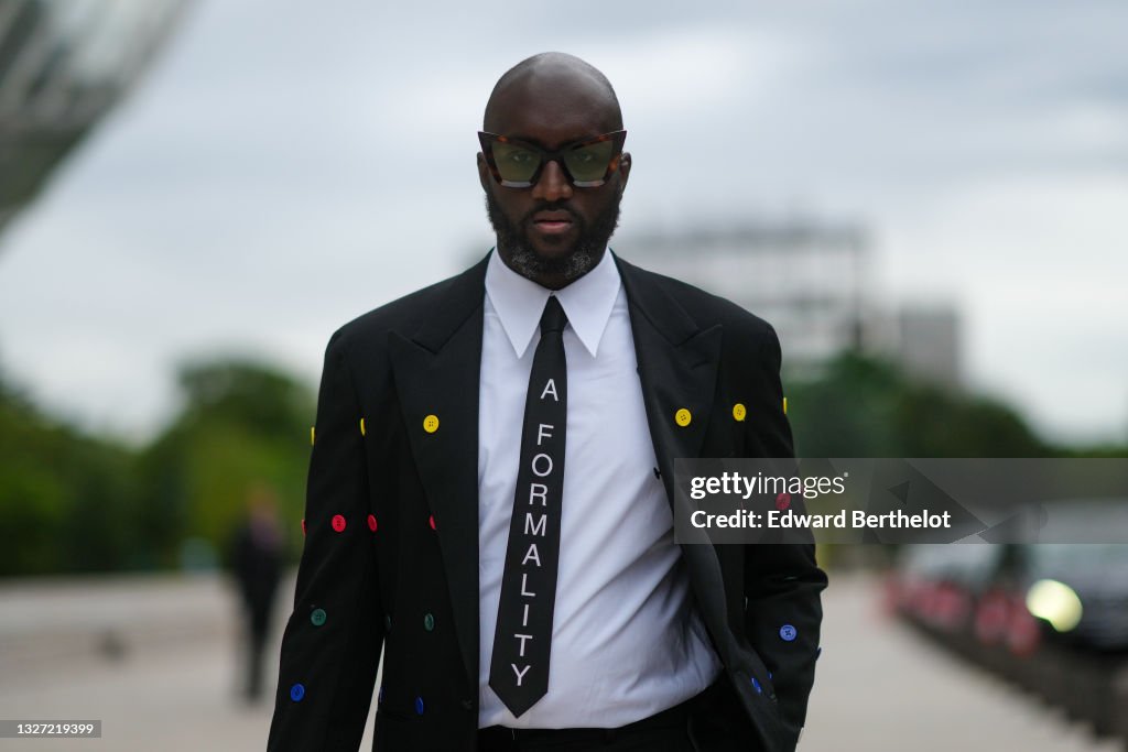 Street Style - Paris Fashion Week - Haute Couture Fall/Winter 2021/2022 : Day One