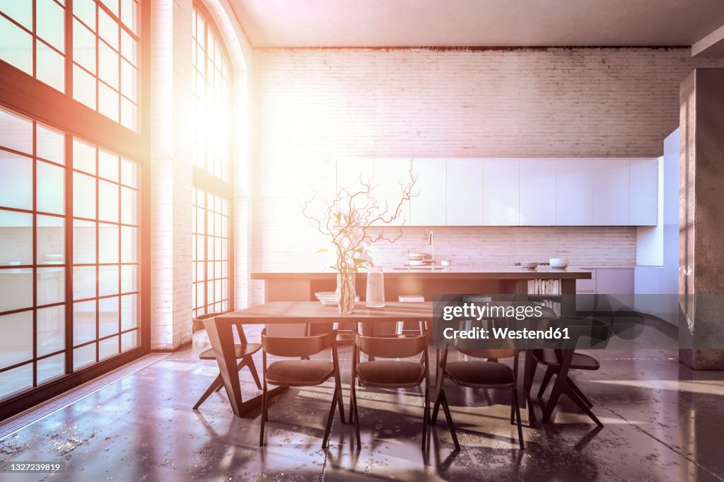 Sunlight streaming through windows in modern kitchen