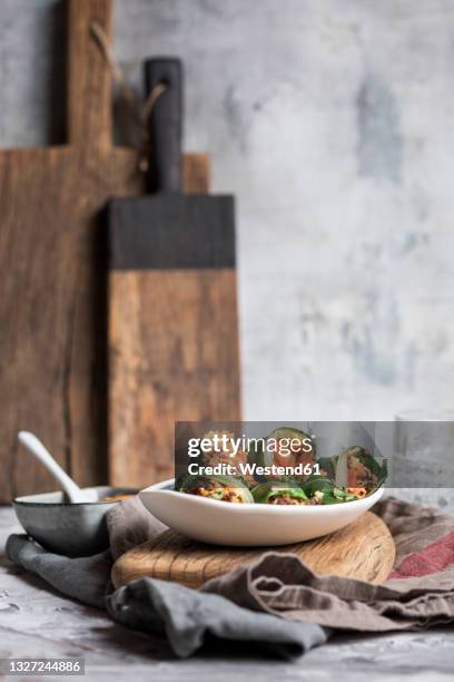 steamed chard leaves spring roll with chopped vegetable and meat filling in tray - frühlingsrolle stock-fotos und bilder