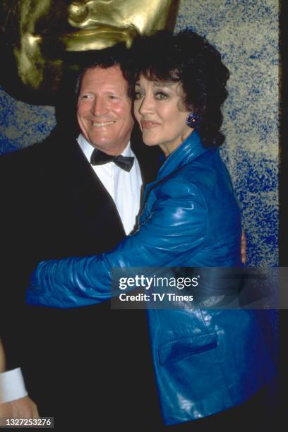 Actors Johnny Briggs and Amanda Barrie photographed at the BAFTA Film and Television Awards at the Royal Albert Hall in London on April 29, 1997.