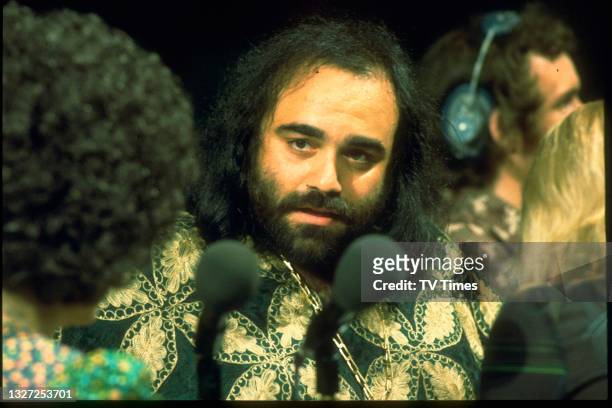 Greek singer Demis Roussos performing live on stage at Kings Hall in Manchester for a recording of The International Pop Proms, circa 1976.