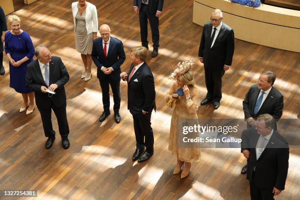 King Willem-Alexander and Queen Maxima of the Netherlands stand with the heads of Germany's 16 states at a session of the Bundesrat in their honour...