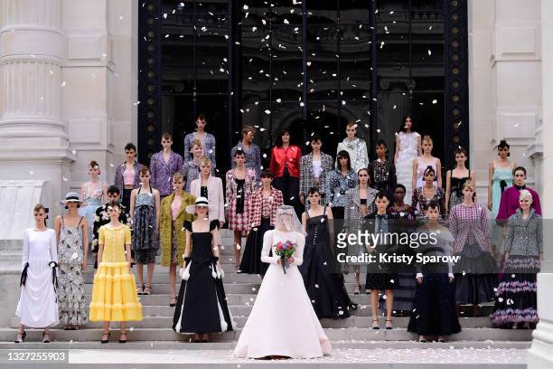 Virginie Viard with models on the runway during the Chanel Couture Haute Couture Fall/Winter 2021/2022 show as part of Paris Fashion Week on July 06,...