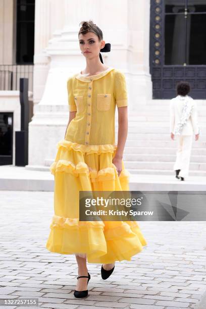 Model walks the runway during the Chanel Couture Haute Couture Fall/Winter 2021/2022 show as part of Paris Fashion Week on July 06, 2021 in Paris,...