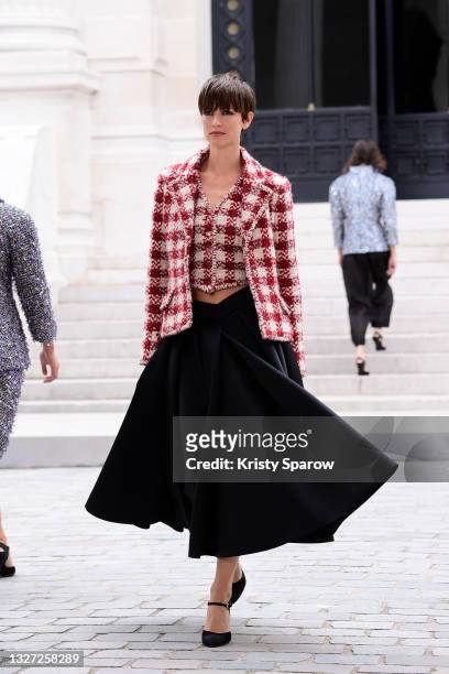 Model walks the runway during the Chanel Couture Haute Couture Fall/Winter 2021/2022 show as part of Paris Fashion Week on July 06, 2021 in Paris,...