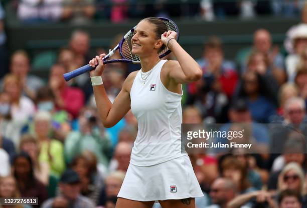 Karolina Pliskova of The Czech Republic celebrates victory after winning her Ladies' Singles Quarter Final match against Viktorija Golubic of...