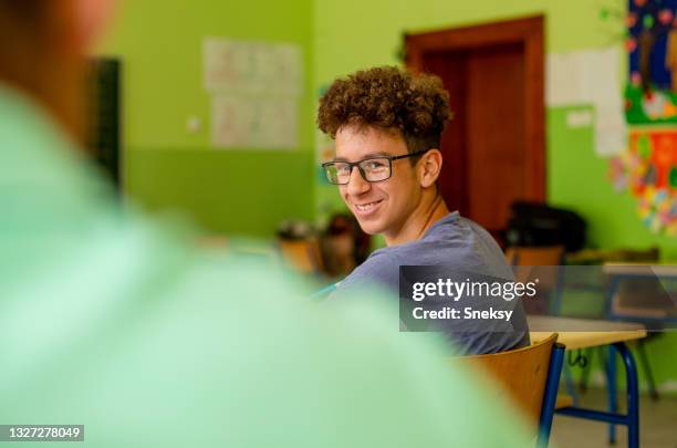 boy with eyeglasses is solving test. - examination table bildbanksfoton och bilder