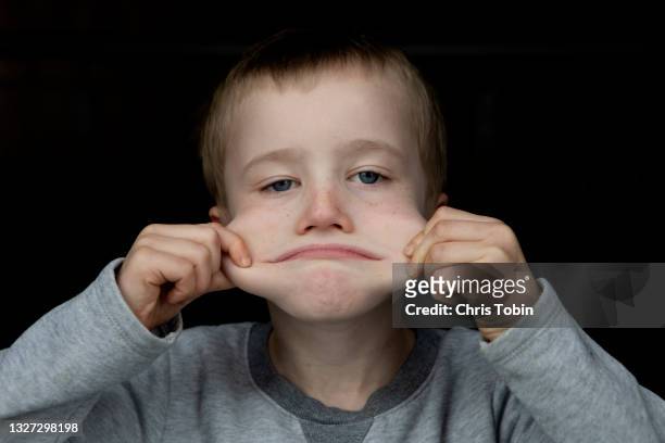 120 Portrait Of A Boy Pulling A Funny Face Photos and Premium High Res  Pictures - Getty Images