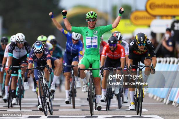 Mark Cavendish of The United Kingdom and Team Deceuninck - Quick-Step Green Points Jersey Green Points Jersey stage winner celebrates at arrival,...