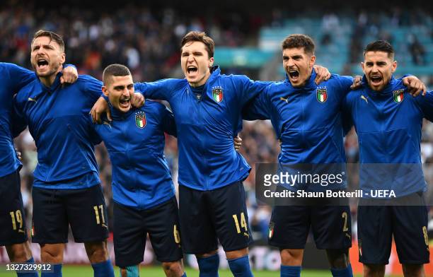 Ciro Immobile, Marco Verratti, Federico Chiesa, Giovanni Di Lorenzo and Jorginho of Italy sing the national anthem prior to the UEFA Euro 2020...