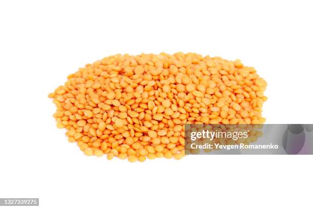 red lentil on white background - lentil stock pictures, royalty-free photos & images