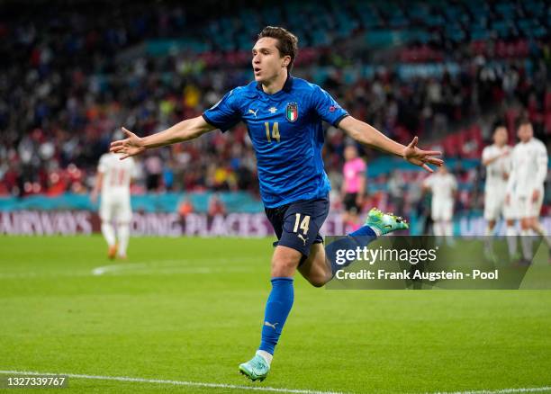 Federico Chiesa of Italy celebrates after scoring their side's first goal during the UEFA Euro 2020 Championship Semi-final match between Italy and...