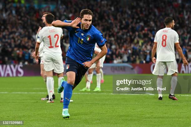 Federico Chiesa of Italy celebrates after scoring their side's first goal during the UEFA Euro 2020 Championship Semi-final match between Italy and...