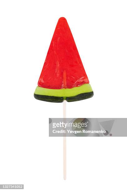lollipop on a stick in a shape of watermelon slice - hartbonbon stock-fotos und bilder
