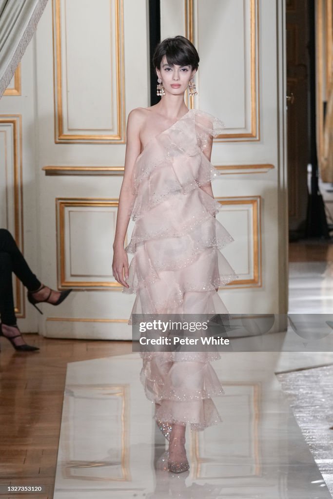 A model walks the runway during the Giorgio Armani Prive Couture