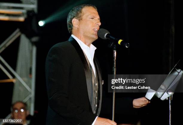 American singer and songwriter Michael Bolton sings at the 1998 MusiCares benefit dinner on February 23, 1998 in New York, New York. Luciano...