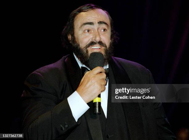 Italian operatic tenor Luciano Pavarotti speaks at the 1998 MusiCares benefit dinner on February 23, 1998 in New York, New York. Pavarotti was...