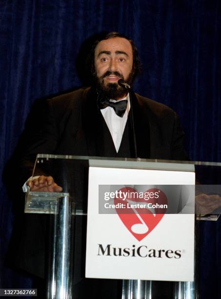 Italian operatic tenor Luciano Pavarotti speaks at the 1998 MusiCares benefit dinner on February 23, 1998 in New York, New York. Pavarotti was...