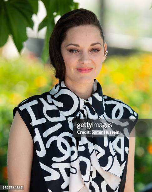 Marion Cotillard attends the "Annette" photocall during the 74th annual Cannes Film Festival on July 06, 2021 in Cannes, France.