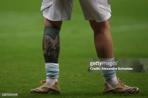 Detail of Lionel Messi of Argentina leg tattoo before a semi-final match of Copa America Brazil 2021 between Argentina and Colombia at Mane Garrincha...