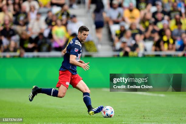 Matt Polster of New England Revolution controls the ball against the Columbus Crew in the first half during their game at Lower.com Field on July 03,...