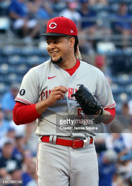 Starting pitcher Luis Castillo of the Cincinnati Reds reacts after catching a line drive for the second out during the 1st inning of the game against...
