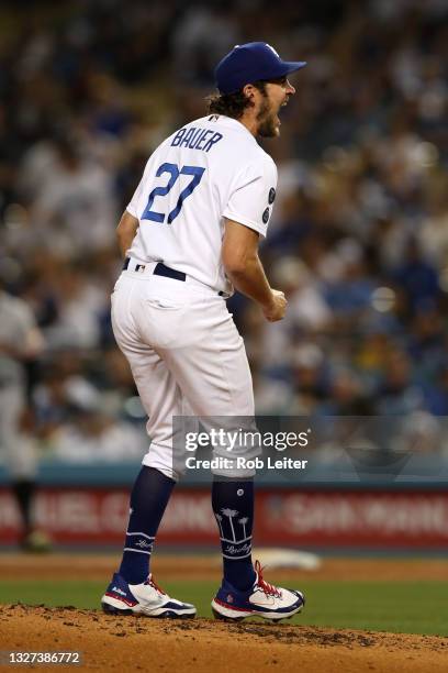 Trevor Bauer of the Los Angeles Dodgers celebrates during the game against the San Francisco Giants at Dodger Stadium on June 28, 2021 in Los...