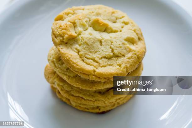 white chocolate chip cookies.cookie stack. - chocolate cookies stock pictures, royalty-free photos & images